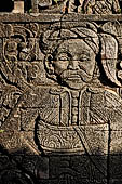 Pura Meduwe Karang - Bali - This local priest is typical of the subject matter of reliefs adorning the side of the main shrine.