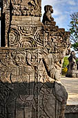 Pura Meduwe Karang - Bali - This local priest is typical of the subject matter of reliefs adorning the side of the main shrine.