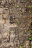 Pura Meduwe Karang - Bali - Reliefs adorning the basement walls of the central shrine, which show people and scenes from everyday life.