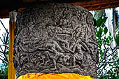 Pejeng, Bali - Pura Pusering Jagat. holy water vessel whose exterior is sculpted with a detailed relief of the Hindu myth of 'the churning of the sea of milk'.
