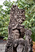 Pura Beji Sangsit , Bali, Candi Bentar at the entrance of the temple, details of the sculptures.