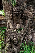 Pura Beji Sangsit , Bali, Candi Bentar at the entrance of the temple, details of the sculptures.
