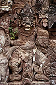 Pura Beji Sangsit , Bali, Candi Bentar at the entrance of the temple, details of the sculptures.
