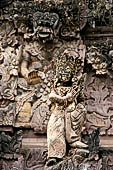 Pura Beji Sangsit , Bali, covered gate (Kori Agung) of the inner courtyard, details of the sculptures.