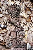 Pura Beji Sangsit , Bali, covered gate (Kori Agung) of the inner courtyard, details of the sculptures.