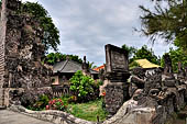 Pura Beji Sangsit , Bali, Candi Bentar at the entrance of the temple, details of the sculptures.