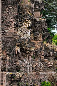 Pura Beji Sangsit , Bali, Candi Bentar at the entrance of the temple, details of the sculptures.