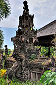 Pura Beji Sangsit , Bali, Candi Bentar at the entrance of the temple, details of the sculptures.