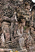 Pura Beji Sangsit , Bali, Candi Bentar at the entrance of the temple, details of the sculptures.