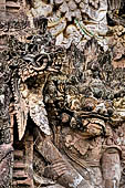 Pura Beji Sangsit , Bali, Candi Bentar at the entrance of the temple, details of the sculptures.
