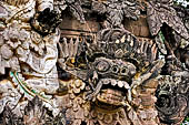 Pura Beji Sangsit , Bali, Candi Bentar at the entrance of the temple, details of the sculptures.