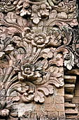 Pura Beji Sangsit , Bali, Candi Bentar at the entrance of the temple, details of the sculptures.