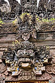 Pura Beji Sangsit , Bali, covered gate (Kori Agung) of the inner courtyard, details of the sculptures.