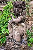 Pura Beji Sangsit , Bali, covered gate (Kori Agung) of the inner courtyard, details of the sculptures.