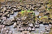 Pura Beji Sangsit , Bali, platforms and shrines of the inner courtyard, details of the sculptures.