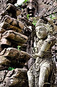 Pura Beji Sangsit , Bali, platforms and shrines of the inner courtyard, details of the sculptures.