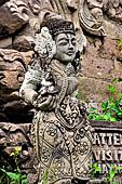 Pura Beji Sangsit , Bali, platforms and shrines of the inner courtyard, details of the sculptures.