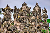 Pura Beji Sangsit , Bali, platforms and shrines of the inner courtyard, details of the sculptures.