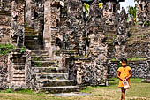 Pura Beji Sangsit , Bali, platforms and shrines of the inner courtyard, details of the sculptures.