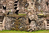 Pura Beji Sangsit , Bali, platforms and shrines of the inner courtyard, details of the sculptures.