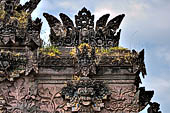 Pura Beji Sangsit , Bali, covered gate (Kori Agung) of the inner courtyard, details of the sculptures.
