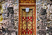 Pura Beji Sangsit , Bali, covered gate (Kori Agung) of the inner courtyard, details of the sculptures.