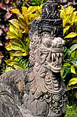 Pura Beji Sangsit , Bali, covered gate (Kori Agung) of the inner courtyard, details of the sculptures.