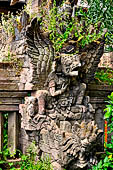 Pura Beji Sangsit , Bali, covered gate (Kori Agung) of the inner courtyard, details of the sculptures.