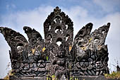 Pura Beji Sangsit , Bali, covered gate (Kori Agung) of the inner courtyard, details of the sculptures.