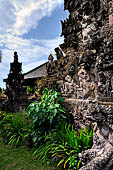 Pura Beji Sangsit , Bali, Candi Bentar at the entrance of the temple, details of the sculptures.