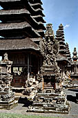 Pura Taman Ayun - Bali. The inner courtyard contains various multi tiered meru's and pavilions. Padmasana with sculpture of Vishnu riding Garuda.