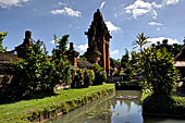 Pura Taman Ayun - Bali. The inner courtyard contains various multi tiered meru's and pavilions and is surrounded by and a moat.