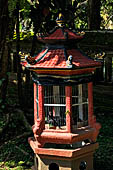 Pura Taman Ayun - Bali. Cage for rooster bred for cock fighting.