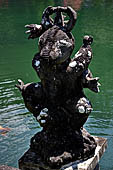 Tirtagangga, Bali - the Demon island in the middle of the south pond. 