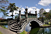 Tirtagangga, Bali - The stone bridges connecting the demon island in the middle of the south pond. 