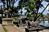 Tirtagangga, Bali - The various statues lined at the entrance on the garden.