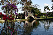 Tirtagangga, Bali - The stone bridges connecting the demon island in the middle of the south pond.