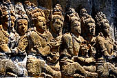 Borobudur reliefs - First Gallery, South-Eastern side - Panel 7. Lalitavistara. Sakyamuni asks gods which form he should choose when he decends. Detail.