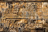 Borobudur reliefs - First Gallery, Western side - Lalitavistara. Panel 55. King tries to entertain Sakiamuni. 