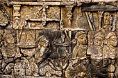 Borobudur reliefs - First Gallery, Western side - Panel 56. Episode from the avadana with the scales weighing the dove and the flesh of the king. 