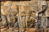Borobudur reliefs - First Gallery, Western side - Panel 59. 