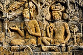 Borobudur reliefs - First Gallery, Northern side - Panel 77. 