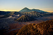Bromo - the Pananjakan view point. The view embraces the immense caldera with the cones of Bromo, Batok and Kursi with the cone of Mt. Semeru in the distance.