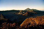 Bromo - the Pananjakan view point. The view embraces the immense caldera with the cones of Bromo, Batok and Kursi with the cone of Mt. Semeru in the distance.