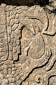 Chichen Itza - The Tzompantli. Bas-relief of a eagle devouring the heart of a defeated victim. 