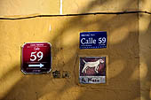Merida - street sign plaques at the corner of the roads. 
