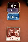 Merida - street sign plaques at the corner of the roads.