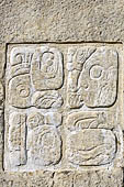 Palenque - The Palace. Patio of the Captives (Patio de los Cautivos), images at base of House C, glyph caption of the second captive from right.