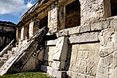 Palenque - The Palace. Patio of the Captives (Patio de los Cautivos), figures at the platform of House C, second and third captive from right. 