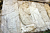 Palenque - The Palace. Patio of the Captives (Patio de los Cautivos), detail of the figure at the right side of the stairway of House A. 